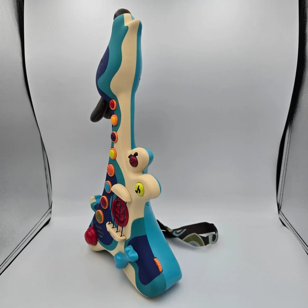 B. Toys Woofer Guitar Dog Musical Toy Blue Cream Acoustic Electric Hound Modes